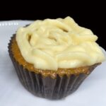 Carrot Cupcake with Cream cheese frosting on Plate Carrot Cupcake with Cream cheese frosting