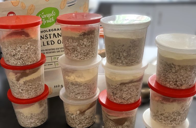 Reusable cups filled with gluten-free instant oatmeal mix and flavour add-ins.